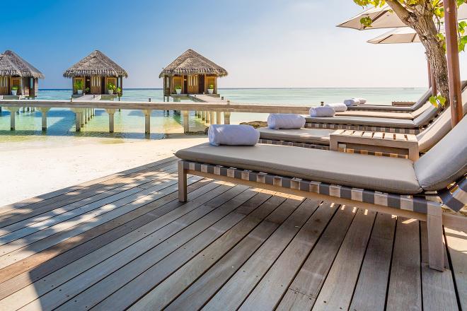 Deck by the ocean at a sunny resort